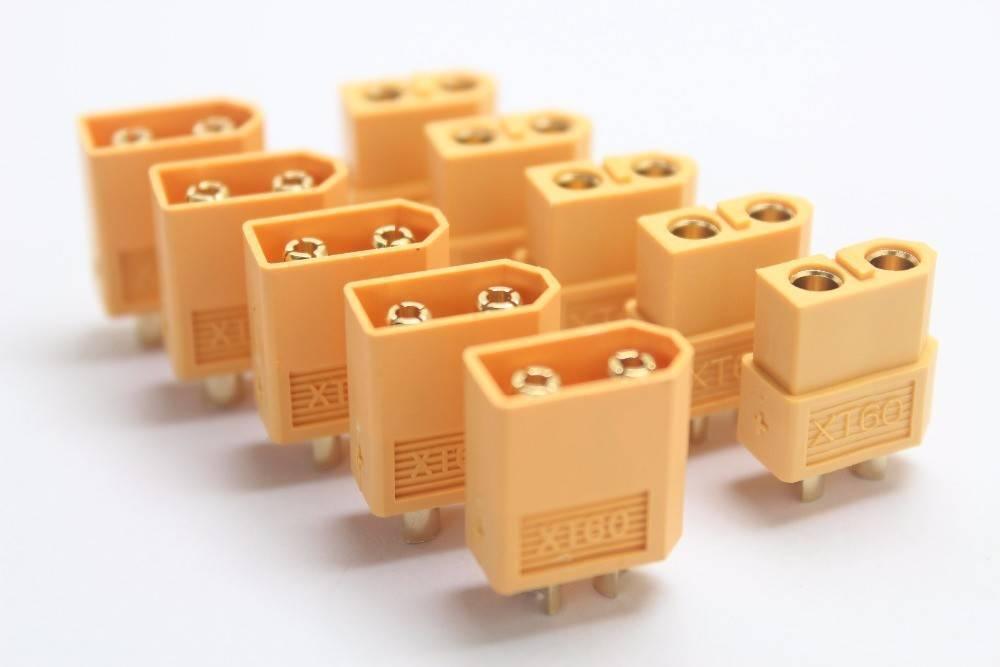 XT60 XT-60 Male Female Bullet Connectors Plugs - a collection of yellow plastic male and female bullet plugs arranged on a white surface.