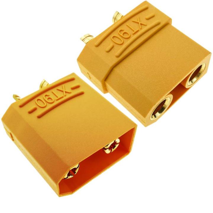 XT90 Male-Female Connector XT90 High Current Connectors Pair - Female Male XT-90 XT 90 - one yellow plastic XT90 male connector and one yellow plastic XT90 female connector with gold-plated terminals.