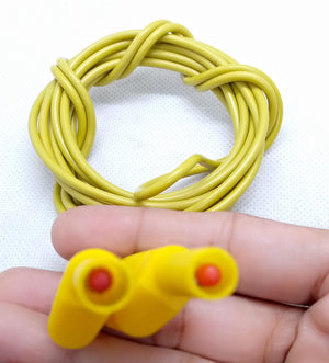 Yellow Banana Clip Wires 2 Meter | High-Quality Test Leads | Digilog.pk - with two yellow banana plug connectors held in a hand.