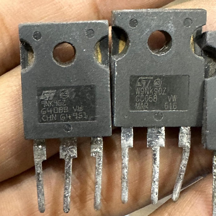YGD65N65 IGBT Power Transistor - shown as a close-up of two dark grey, three-pin electronic components with visible manufacturer markings on their surfaces.