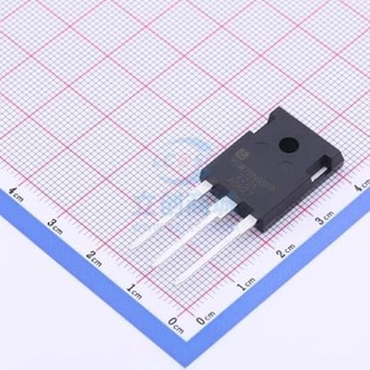 YGW75N65FP IGBT Power Semiconductor - a black three-pin electronic component placed on a grid-patterned surface for scale.