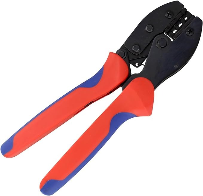 YTH-2546B Solar Crimper MC3 MC4 Crimping Tool - a black metal crimping head with multiple slots and red and blue ergonomic plastic handles.