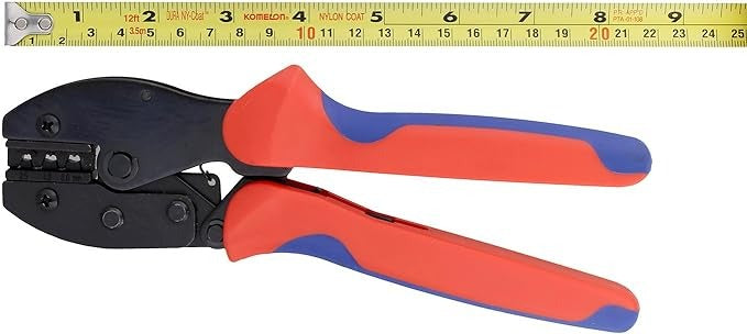 YTH-2546B Solar Crimper MC3 MC4 Crimping Tool - shown with red and blue handles next to a yellow measuring tape indicating a length of approximately 22 cm.