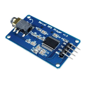 YX5300 MP3 Music Player UART Control Serial Module - a blue rectangular circuit board featuring a 3.5mm audio jack, a central chip, and four header pins.