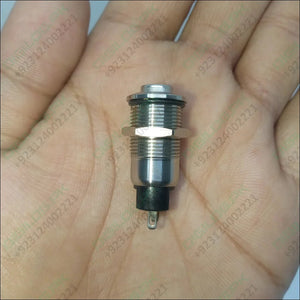 ZLQ-B5V 12mm Waterproof Metal Push ON Push OFF Button Switch With Power Indication - a silver-coloured cylindrical metal button held in a hand with a black base and connector.