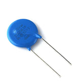 Zov 20D561K Metal Oxide Varistor - Voltage Surge Protection Component - a blue circular electronic component with two metal leads and text printed on its surface, shown on a white background.